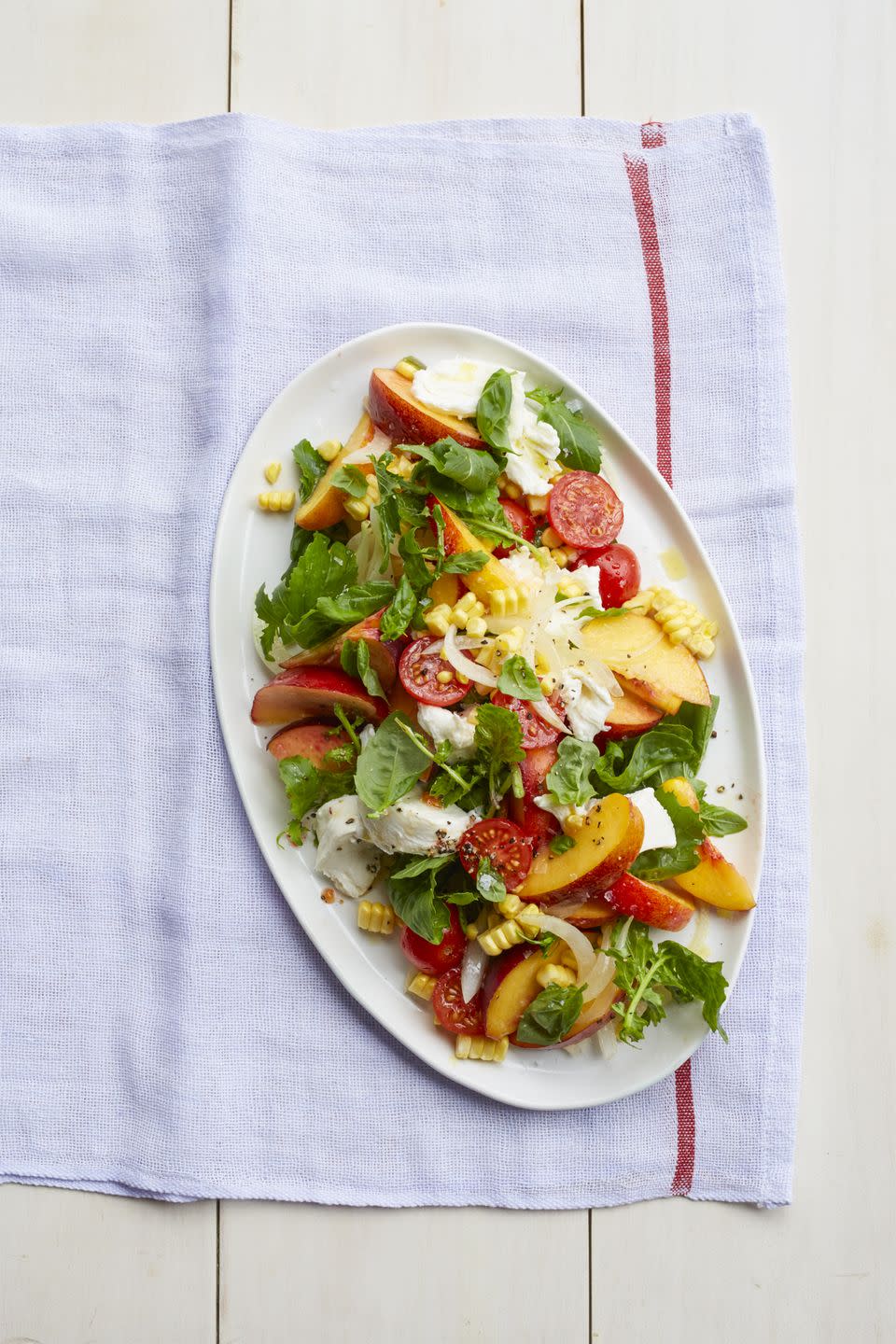 <p>Fresh peaches will add a whole new layer of flavor to your favorite caprese recipe.</p><p><a href="https://www.womansday.com/food-recipes/food-drinks/recipes/a55295/peach-caprese-salad-recipe/" rel="nofollow noopener" target="_blank" data-ylk="slk:Get the recipe Peach Caprese Salad.;elm:context_link;itc:0;sec:content-canvas" class="link "><em>Get the recipe Peach Caprese Salad.</em></a> </p>