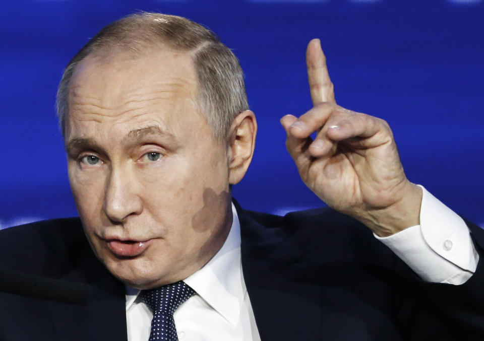 FILE - In this Nov. 20, 2019, file photo, Russian President Vladimir Putin gestures while speaking during an annual VTB Capital "Russia Calling!" Investment Forum in Moscow, Russia. Attempts over the years to silence Kremlin critic Alexei Navalny have all failed so far. Now Navalny is in a coma in a Berlin hospital after suffering what German authorities say was a poisoning with a chemical nerve agent while traveling in Siberia on Aug. 20. The Kremlin has denied involvement. Although stunned by the attempt on his life, his supporters got back to work on their latest campaign against Putin’s government. (AP Photo/Alexander Zemlianichenko, Pool, File)