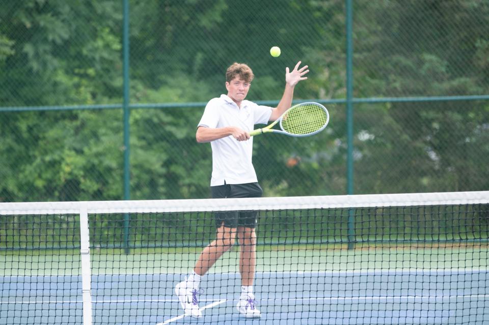 Lakeview's Colin Yarger serves during a match against Battle Creek Central at Lakeview High School on Monday, Aug. 21, 2023.