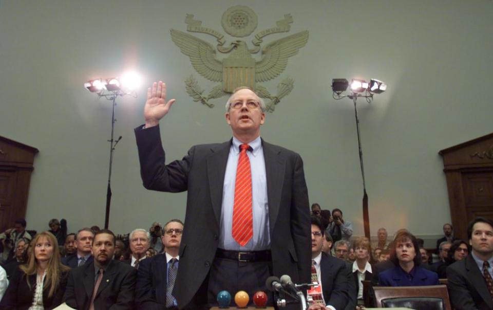 Kenneth Starr is sworn in on Capitol Hill Thursday in 1998, prior to testifying before the House judiciary committee’s impeachment hearing against Bill Clinton.