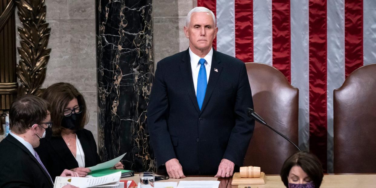 Vice President Mike Pence returns to the House chamber after midnight, Jan. 7, 2021, to finish the work of the Electoral College after a mob loyal to President Donald Trump stormed the Capitol in Washington and disrupted the process.