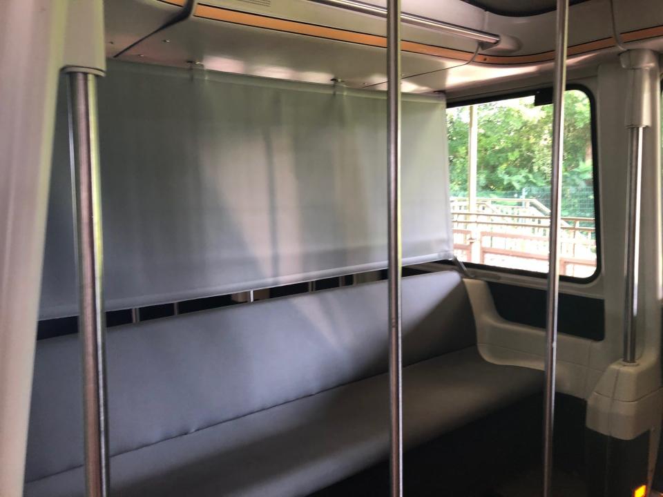 Disney's monorail cabins, which are normally standing-room only, have been divided up using vinyl barriers, and only one or two families were allowed in each.