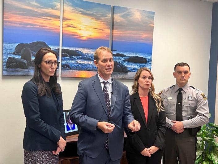 From left, Assistant District Attorney Kristi Severo, District Attorney Ben David, Jennifer Faircloth Wissman and Trooper Jordan Maness speak following the conclusion of an eight-day trial in New Hanover County Superior Court.