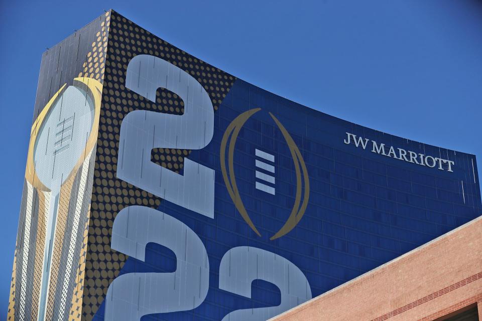The JW Marriott on West St. sports giant signage. as downtown Indianapolis gets ready Tuesday, Jan. 4, 2022 for the NCAA College Football Playoffs championship. 