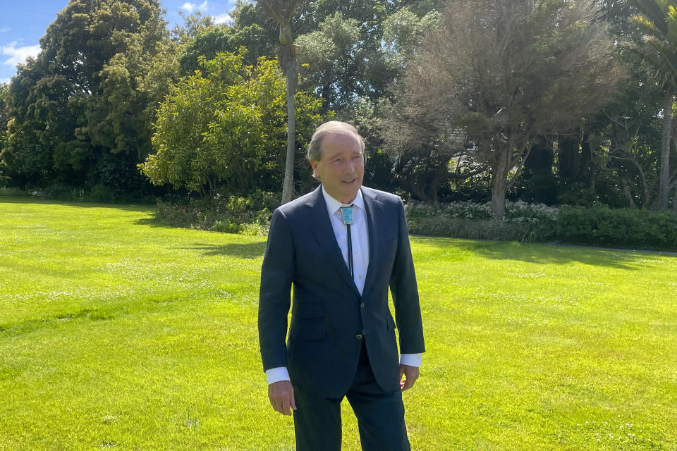 Tom Udall, the new U.S. ambassador to New Zealand walks in the garden at his residence in Wellington, New Zealand, Thursday, Dec. 2, 2021. Udall says he wants to find areas of common ground with China in a region where tensions often run high. (AP Photo/Nick Perry)