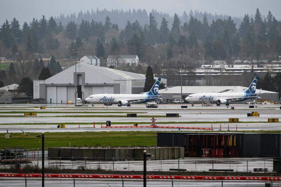 Two Boeing 737 Max 9 aircraft sit on the ground at an Oregon airport on Jan. 9, 2024, awaiting approval to take to the skies once again. <a href="https://www.gettyimages.com/detail/news-photo/alaska-airlines-boeing-737-max-9-aircrafts-n705al-and-news-photo/1913163434" rel="nofollow noopener" target="_blank" data-ylk="slk:Mathieu Lewis-Rolland/Getty Images;elm:context_link;itc:0;sec:content-canvas" class="link ">Mathieu Lewis-Rolland/Getty Images</a>