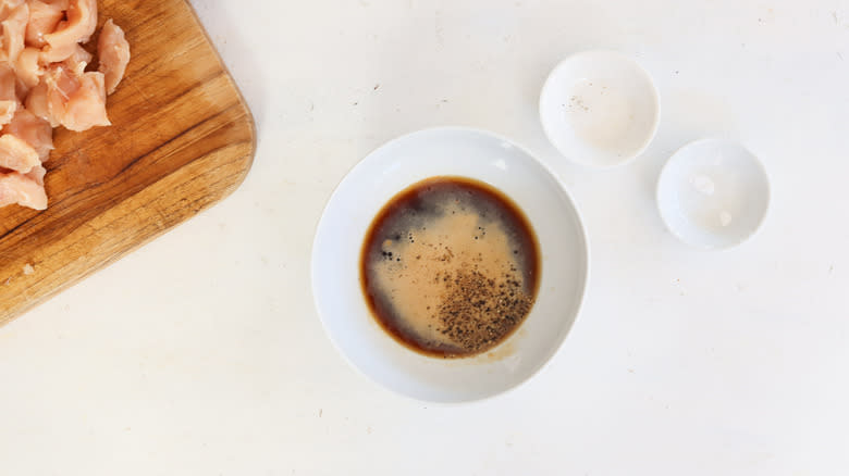 soy sauce mixed in a white bowl bowl