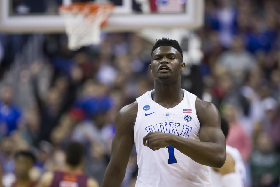 Duke forward Zion Williamson (1) reacts during the second half of an NCAA men's college East Regional semifinal basketball game against Virginia Tech in Washington, Saturday, March 30, 2019. (AP Photo/Alex Brandon)