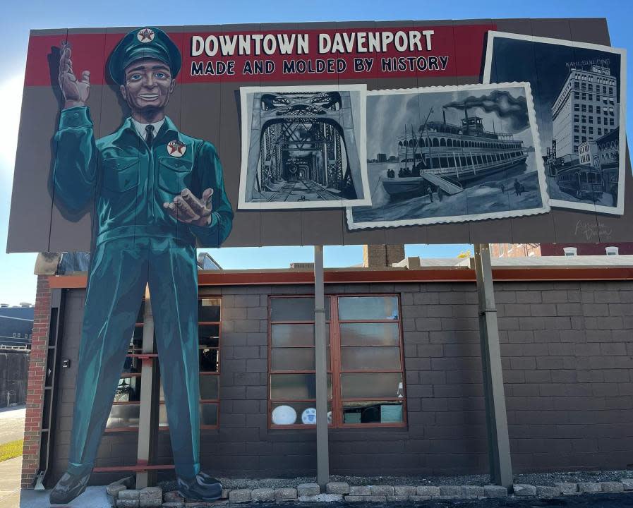 A tall mural for downtown Davenport Dawn did near Harrison and 5th streets.