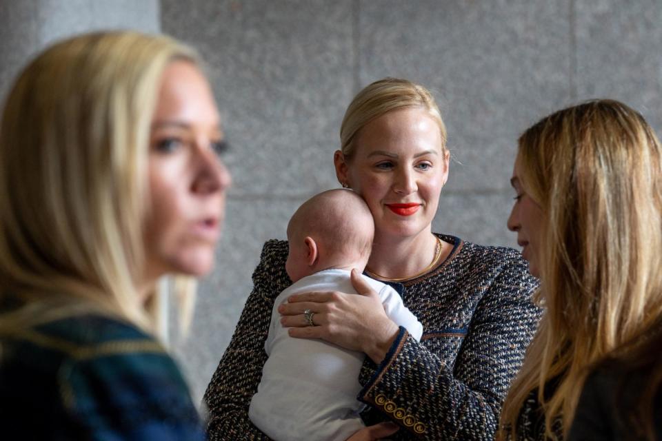 PHOTO: Amanda Zurawski, Dr. Austin Dennard and Taylor Edwards prepare to enter the court room at the Texas Supreme Court in Austin, Texas, on Nov. 28, 2023. (Suzanne Cordeiro/AFP via Getty Images)