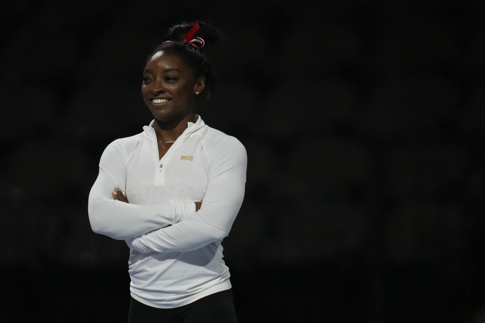 Simone Biles, a seven-time Olympic medalist and the 2016 Olympic champion, warms up during a practice session at the U.S. Classic gymnastics competition Friday, Aug. 4, 2023, in Hoffman Estates, Ill. (AP Photo/Erin Hooley)