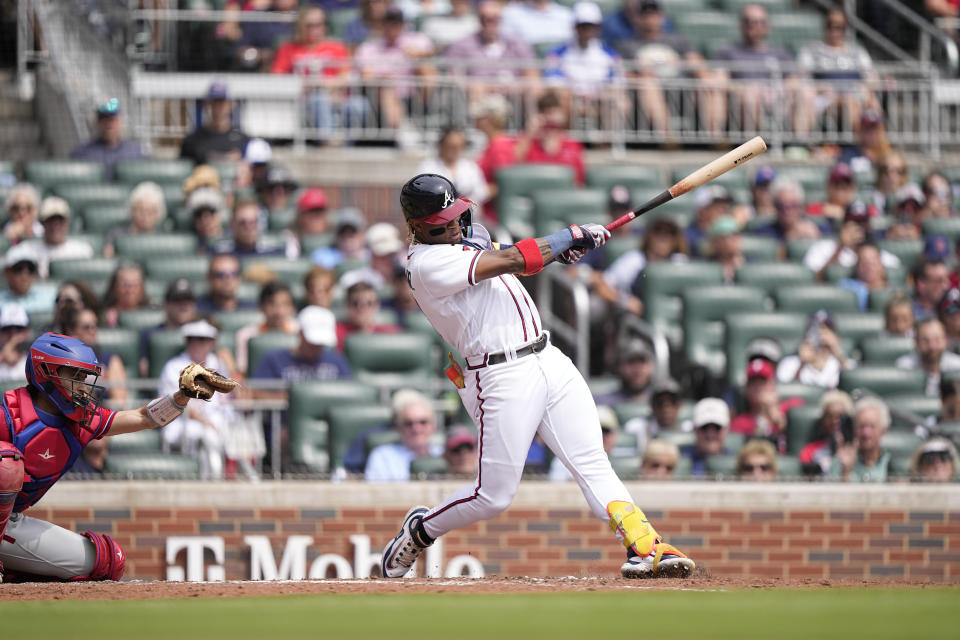 Atlanta Braves' Ronald Acuna Jr. (13) singles in the fourth inning of a baseball game against the Philadelphia Phillies, Wednesday, Sept. 20, 2023, in Atlanta. (AP Photo/Brynn Anderson)