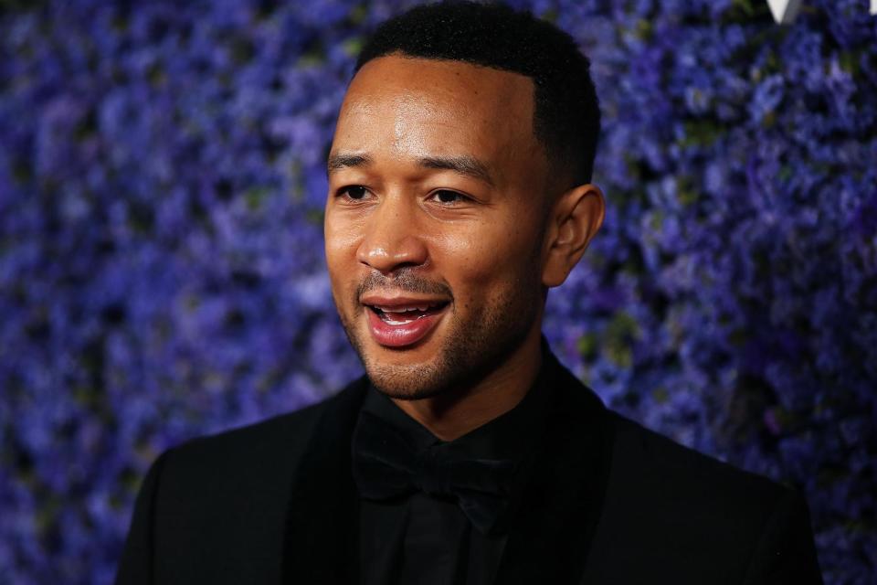 John Legend brands Trump a 'f****** embarrassment' as president holds chaotic press conference post midterms