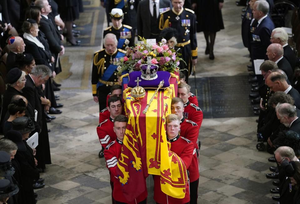 Royal family follow behind the coffin.