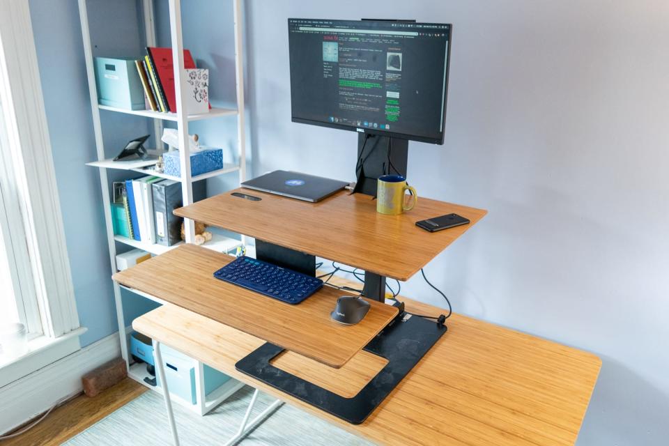 Standing desk converters