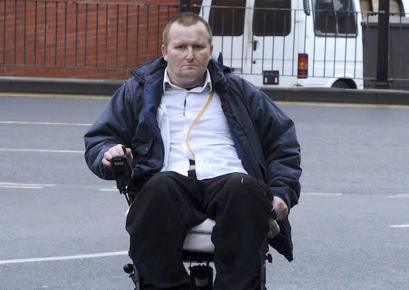 Kurt Baron a disabled man arriving at Burnley Crown Court after he used his 4mph motorised wheelchair as a battering ram to smash up a  Transit van after two workmen refused to move it.  Baron, 40, had warned two North West Electricty engineers: 