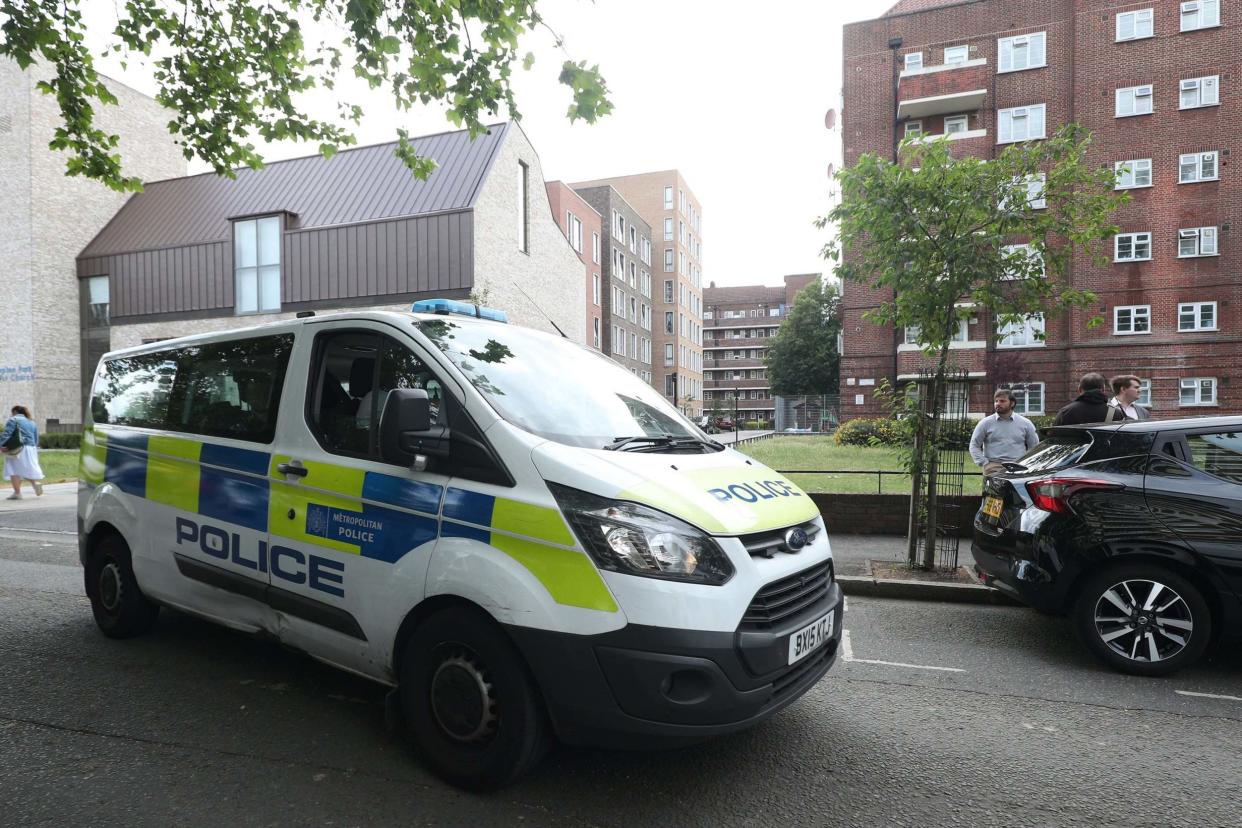 A police van at the scene of the attack on two Scotland Yard officers on Frampton Park Road: PA