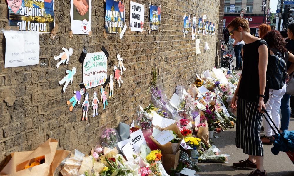 Tributes left near Finsbury Park mosque, north London, after a van was driven into pedestrians.