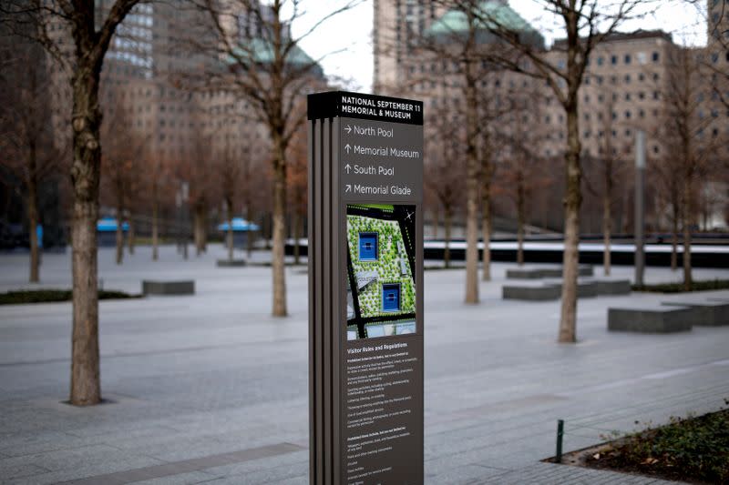 A sign is seen at the closed North Pool of the 911 Memorial in lower Manhattan during outbreak of coronavirus disease (COVID-19) in New York