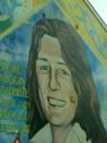 The image of Bobby Sands, a hunger striker who died fighting for Irish Republic rights reminds tourists and locals of the blood bath that ravaged the country.