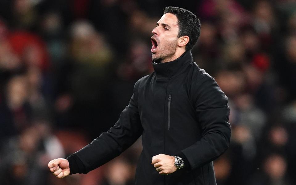 Arsenal manager Mikel Arteta celebrates after the final whistle after the win over Liverpool