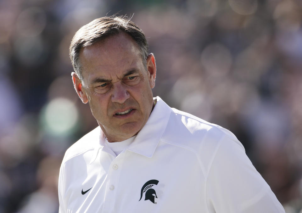 Michigan State coach Mark Dantonio watches his players before the Rose Bowl NCAA college football game against Stanford on Wednesday, Jan. 1, 2014, in Pasadena, Calif. (AP Photo/Jae C. Hong)