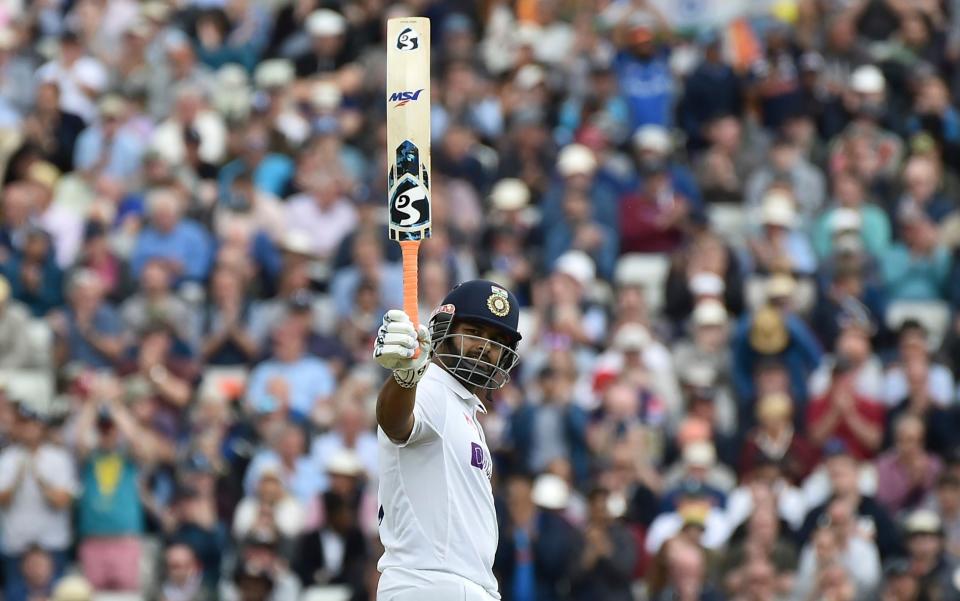 India's Rishabh Pant raises his bat to celebrate scoring fifty runs during the first day of the fifth cricket test match between England and India at Edgbaston in Birmingham, England, Friday, July 1, 2022 - Rue Vieira/AP