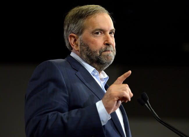 NDP Leader Tom Mulcair speaks at a rally in Ottawa on Wednesday, June 17, 2015. Mulcair is urging Stephen Harper to defend Canada&#39;s supply management system &quot;in its entirety&quot; in the course of negotiating the Trans-Pacific Partnership. THE CANADIAN PRESS/Justin Tang