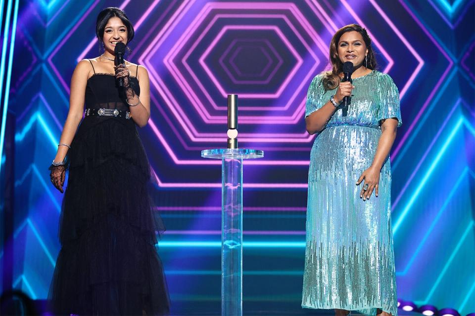 NOVEMBER 15: 2020 E! PEOPLE'S CHOICE AWARDS -- In this image released on November 15, (L-R) Maitreyi Ramakrishnan and Mindy Kaling of "Never Have I Ever", The Comedy Show of 2020, accept the award onstage for the 2020 E! People's Choice Awards held at the Barker Hangar in Santa Monica, California and on broadcast on Sunday, November 15, 2020.