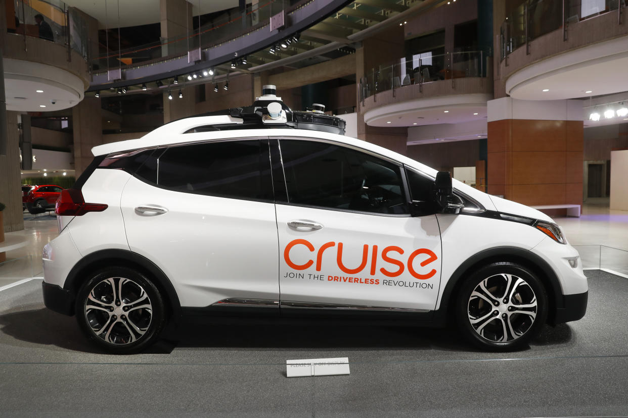 FILE - In this Jan. 16, 2019, file photo, Cruise AV, General Motor's autonomous electric Bolt EV is displayed in Detroit. General Motors’ Cruise autonomous vehicle unit says it will pull the human backup drivers from its vehicles in San Francisco by the end of the year. CEO Dan Ammann says that the Cruise got a permit from California’s Department of Motor Vehicles on Thursday, Oct. 15, 2020 to let the cars travel on their own.  (AP Photo/Paul Sancya, File)