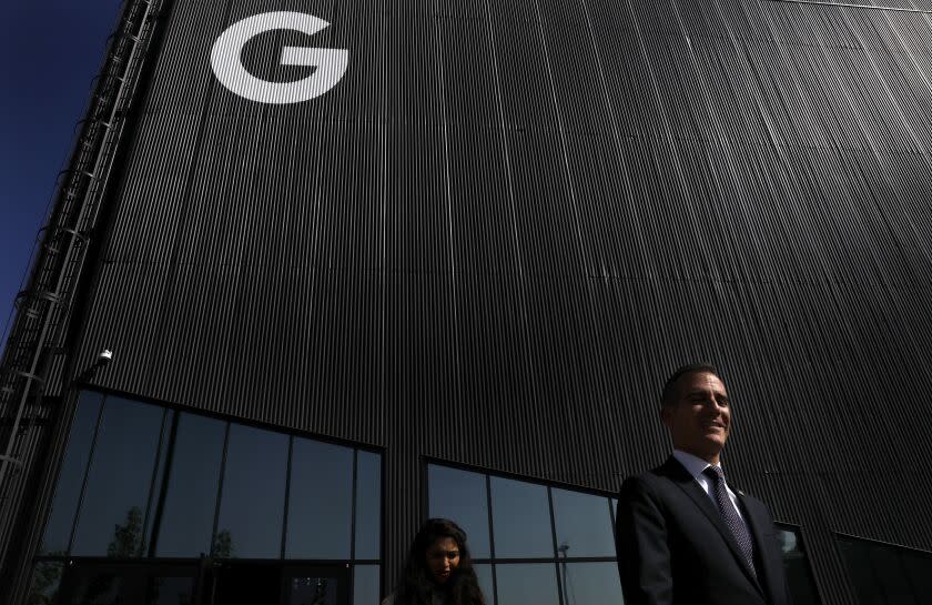 PLAYA VISTA-CA-NOVEMBER 8, 2018: Mayor Eric Garcetti, right, leaves Google's new office at the Spruce Goose hangar in Playa Vista after a tour during its grand opening on Thursday, November 8, 2018. (Christina House / Los Angeles Times)