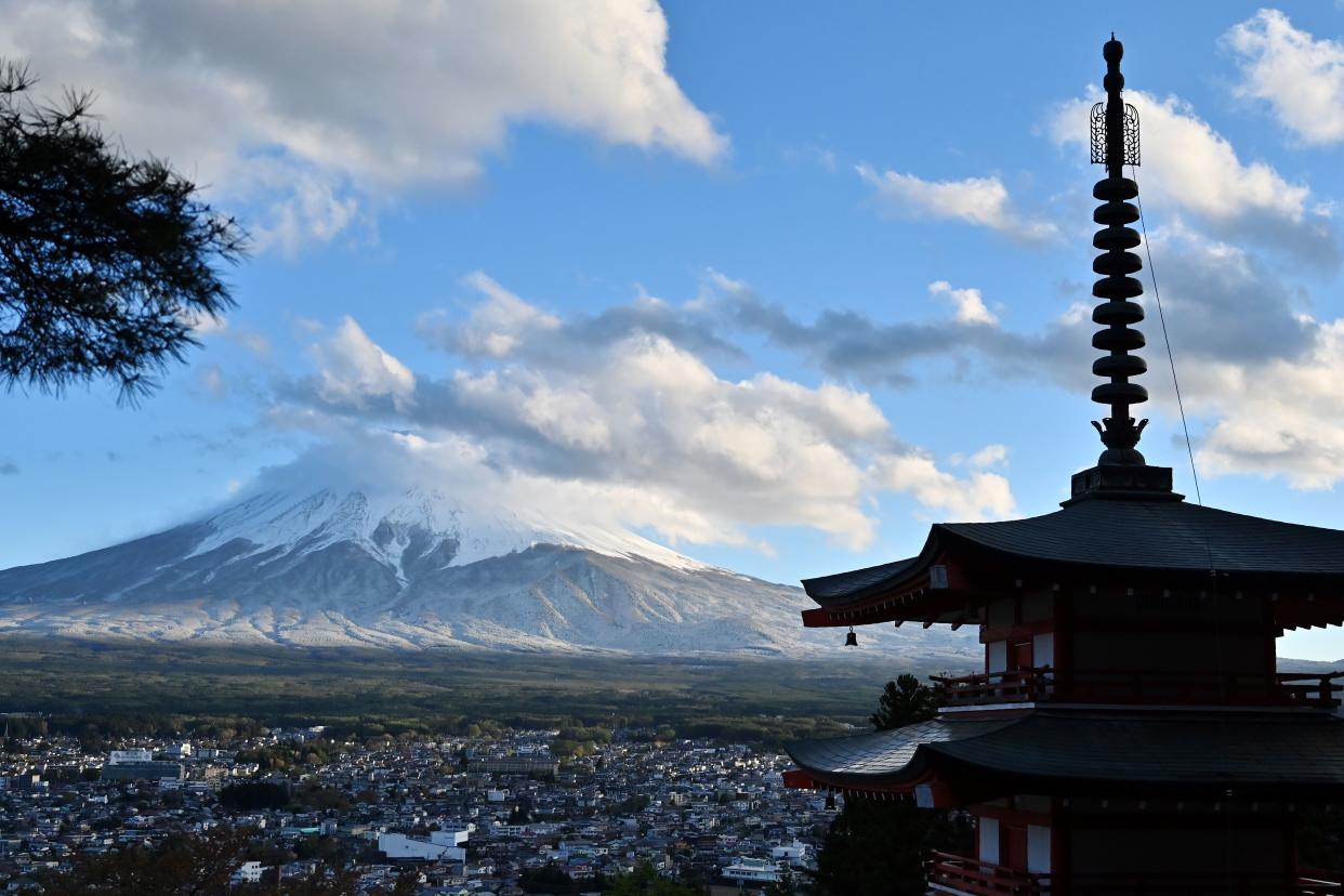 This picture taken on April 27, 2019 shows the Mount Fuji, the highest mountain in Japan, from the Chureito Pagoda in the Fujishoshida village, Yamanashi prefecture. (Photo by Charly TRIBALLEAU / AFP)        (Photo credit should read CHARLY TRIBALLEAU/AFP via Getty Images)