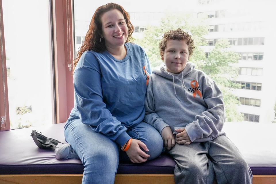 Katie McGloin with her 11-year-old son Justin, who is sick with leukemia and is at Hasbro Children's Hospital awaiting a bone-marrow transplant.