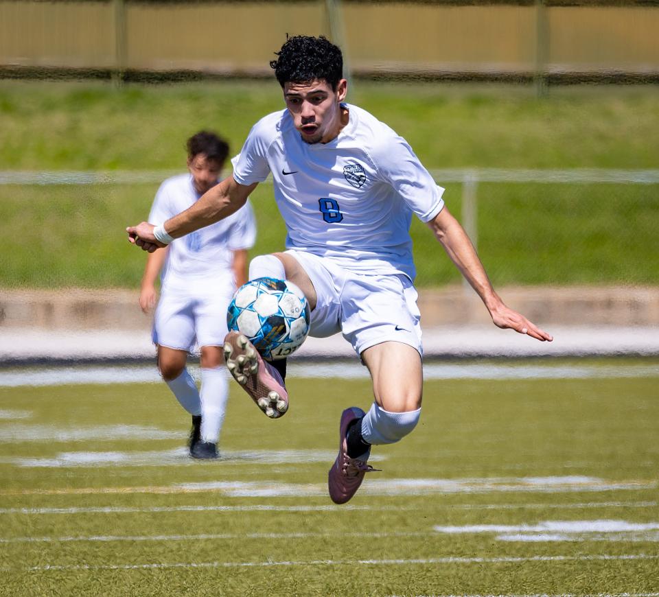 Northeast's Luis Vargas controls the ball to set up for a pass during the Raiders' 3-1 loss to LASA on March 3.