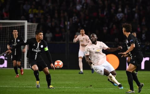 Manchester United's Belgian forward Romelu Lukaku (C-R) runs for the ball next to Paris Saint-Germain's Brazilian defender Thiago Silva and Paris Saint-Germain's German defender Thilo Kehrer - Credit: GETTY IMAGES