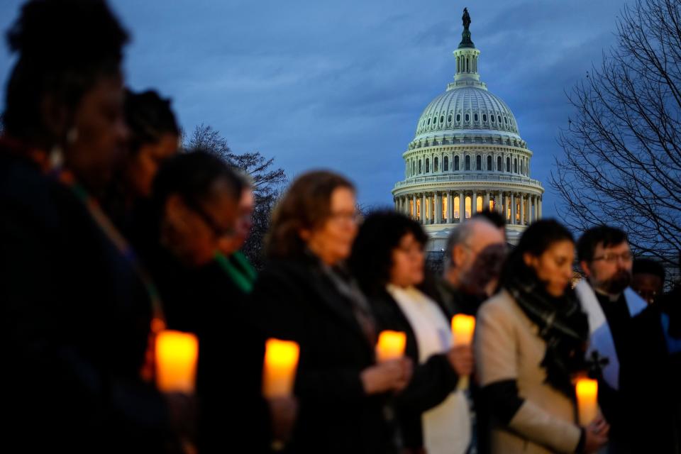 Christian leaders gather for a prayer vigil to mark the second year anniversary of the violent insurrection by supporters of then-President Donald Trump, on Capitol Hill in Washington, Friday, Jan. 6, 2023.