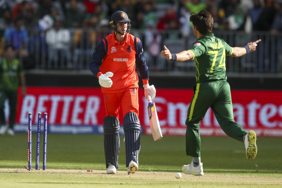 Netherlands' Fred Klaassen reacts after he was dismissed by Pakistan's Mohammad Wasim, right, during the T20 World Cup cricket match between the Netherlands and Pakistani in Perth, Australia, Sunday, Oct. 30, 2022. (AP Photo/Gary Day)