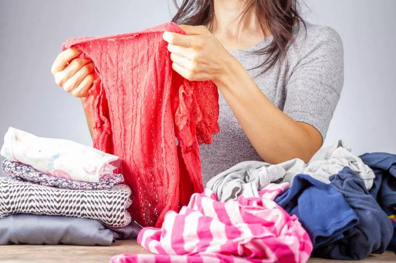 Woman organising laundry