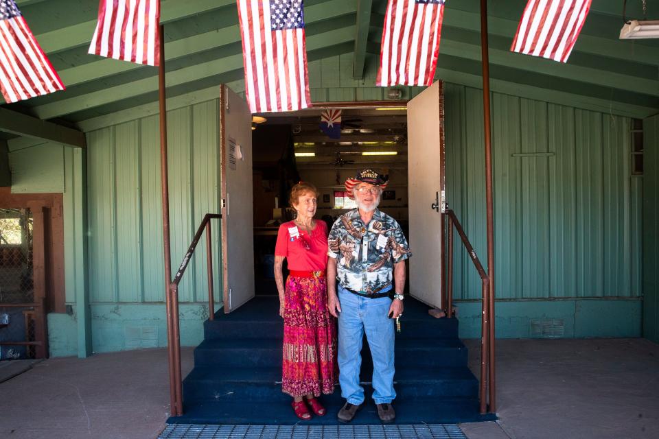 Vietnam Veteran, Ken Baker and his wife Virginia, outside the White Mountain Community Dance Hall in Linden, AZ, July 9, 2021. The number of positive COVID-19 cases linked to a June 11 dance in Arizona's Show Low area has grown to 24 and 2 people have died. Benjamin Chambers/The Republic