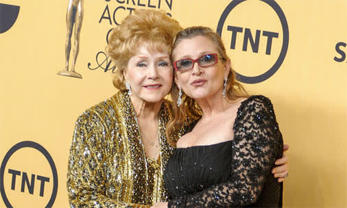 Debbie Reynolds dies just a day after daughter Carrie Fisher's death