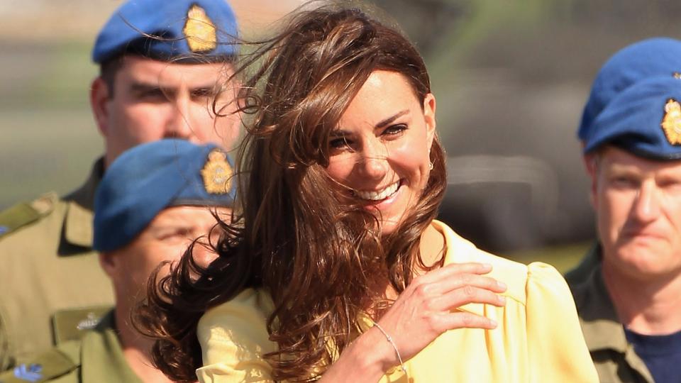 <p> A few months after their wedding in April 2011, Prince William and Kate Middleton embarked on their first overseas tour together in July. </p> <p> Jetting away for a 12-day visit to North America, Kate was caught short by the battering winds sending her usually impeccable hair all over the place. </p> <p> Looking as radiant as ever, she simply laughed it off and styled it out. </p>