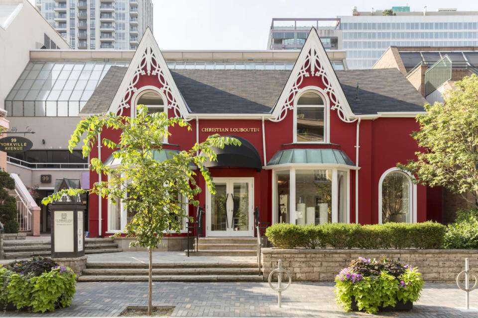 The store is housed in a Victorian-style home painted in the Louboutin signature red.  