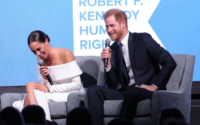 NEW YORK, NEW YORK – DECEMBER 06: Meghan, Duchess of Sussex and Prince Harry, Duke of Sussex speak onstage at the 2022 Robert F. Kennedy Human Rights Ripple of Hope Gala at New York Hilton on December 06, 2022 in New York City. (Photo by Mike Coppola/Getty Images for 2022 Robert F. Kennedy Human Rights Ripple of Hope Gala)