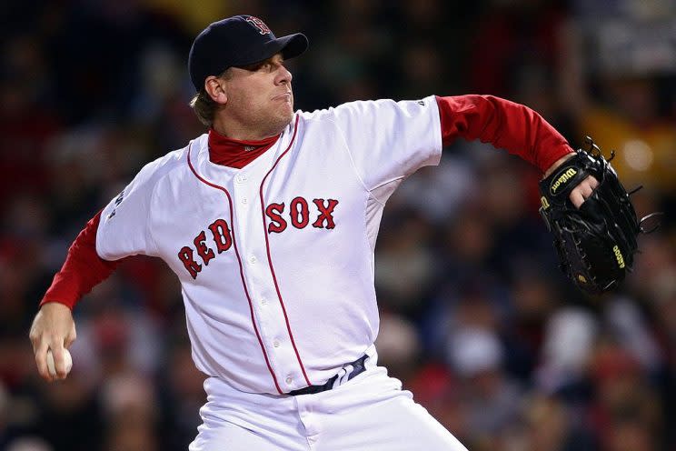 BOSTON - OCTOBER 25: Curt Schilling #38 of the Boston Red Sox pitches against the Colorado Rockies during Game Two of the 2007 Major League Baseball World Series at Fenway Park on October 25, 2007 in Boston, Massachusetts. (Photo by Elsa/Getty Images)