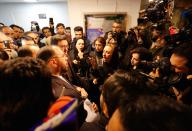 <p>An unidentified relative of one of the crewmen who were onboard ‘Sanchi’ oil tanker that sunk off the coast of China complains to an official of the government inside the Iranian company in Tehran, Iran, Jan. 14, 2018. (Photo: EFE/EPA/Abedin Taherkenareh) </p>