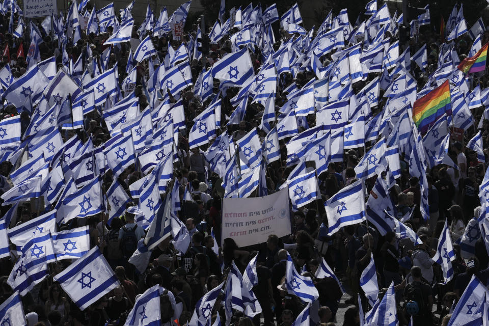 Israelis protest against Prime Minister Benjamin Netanyahu's judicial overhaul plan outside the parliament in Jerusalem, Monday, March 27, 2023. (AP Photo/Mahmoud Illean)