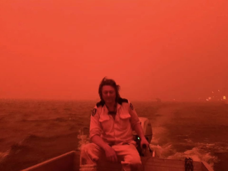 The sky went red as Ms Harvey and her friends Simon (pictured), and Karen were surrounded by flames. Source: Supplied