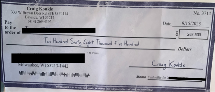 A Wauwatosa resident received a letter offering to buy their house, with a fake check at the top of the advertisement meant to represent the cash offer for the property. The resident's name and address is redacted for privacy.