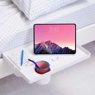 This clip-on bedside shelf