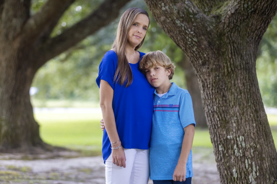 Kristel Robinson and her son Aiden, 11, pose for a portrait outside of their home in Brandon, Miss., Wednesday, September 21, 2022. Aiden was accidentally burned and was treated at the JMS Burn and Reconstruction Center in 2019. The center, which is the only burn center in the state, is set to close in October.